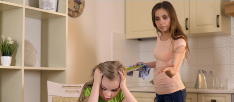 Mom scolding daughter