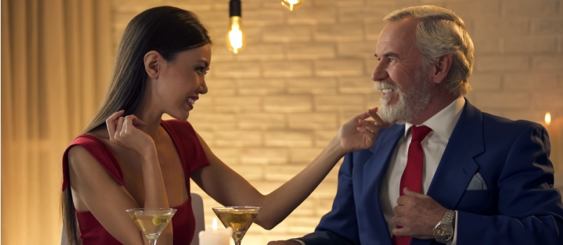 Young lady on a date with mature man