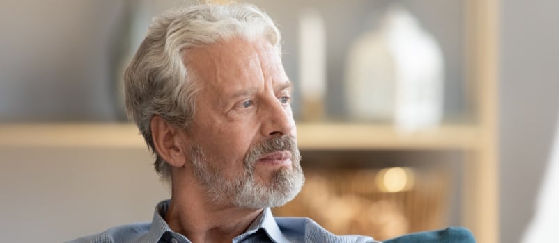 Confident man looking outside