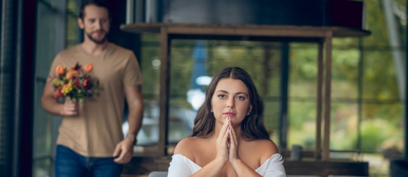 Cafe date serious woman sitting waiting for man