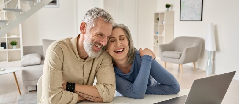Old mature couple laughing