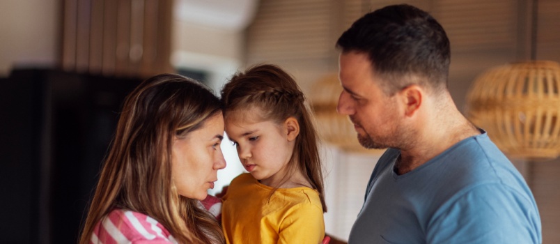 Parents comforting their  kid