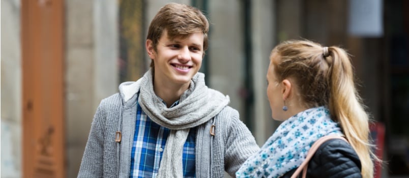 young attractive couple talking top each other 