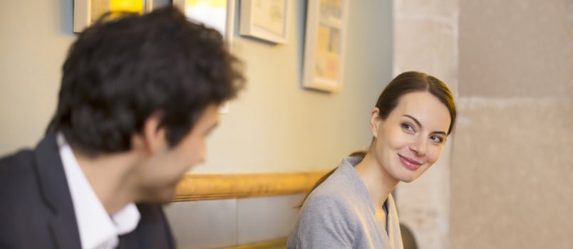 Woman flirting with man