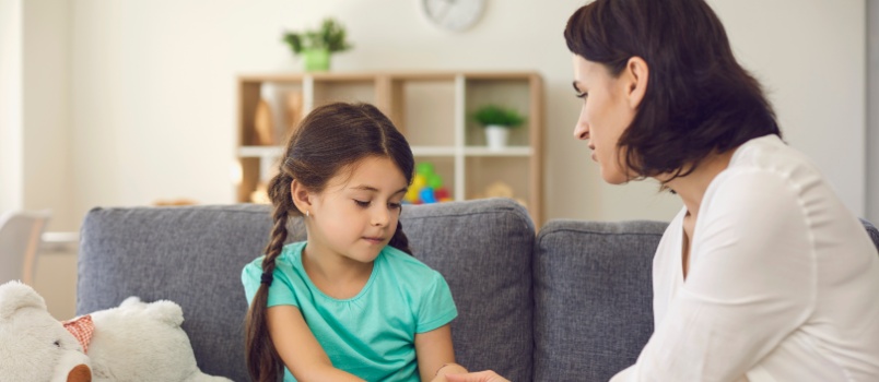 Mother talking to her daughter