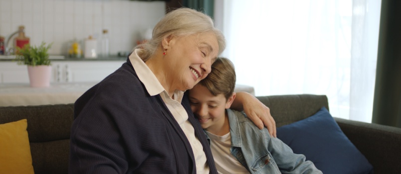 Grandmther hugging grandchild