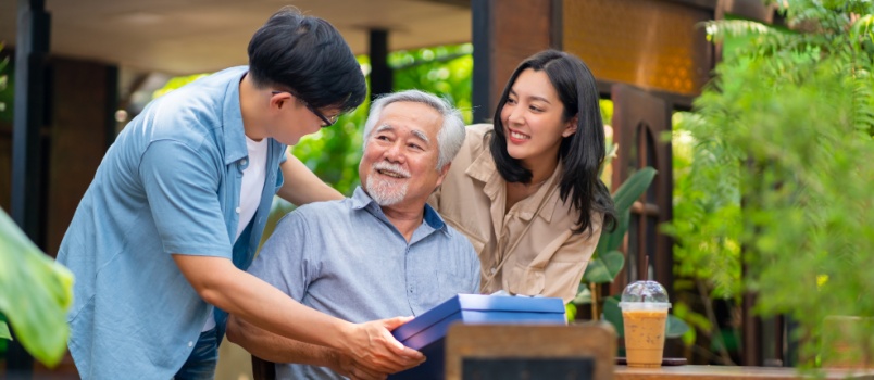 Young man surprising elder brother
