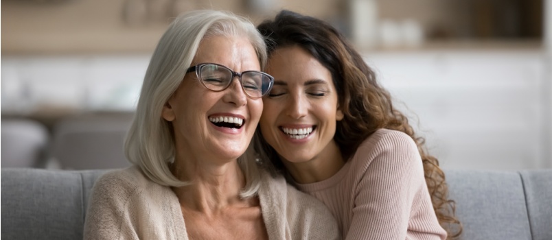 Daughter hugging her mother 