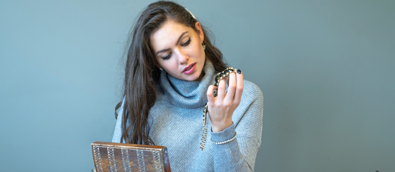 Woman checking her jwellery 