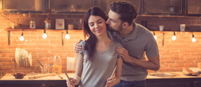young beautiful couple in kitchen