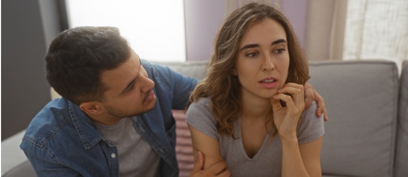 Couple having emotional conversation
