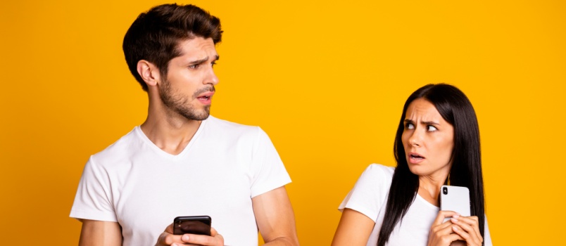 Couple hiding their partner from each other 