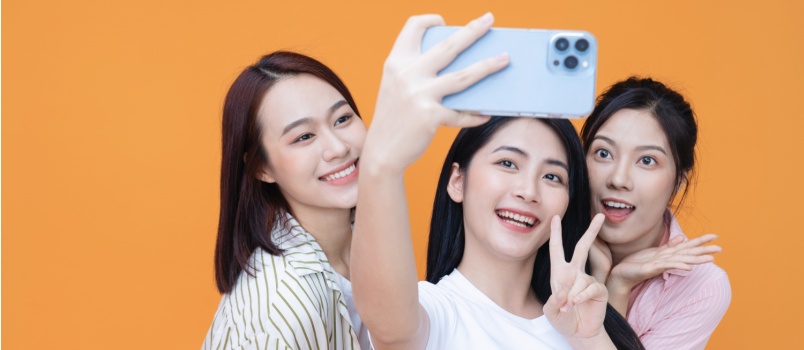 Three asian girls taking selfie