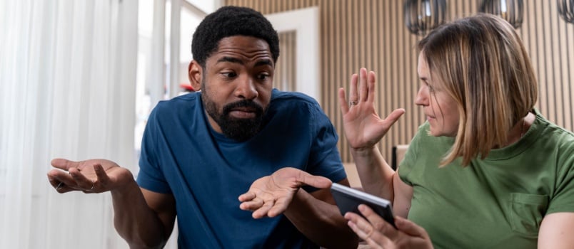 Woman asking questions to man 