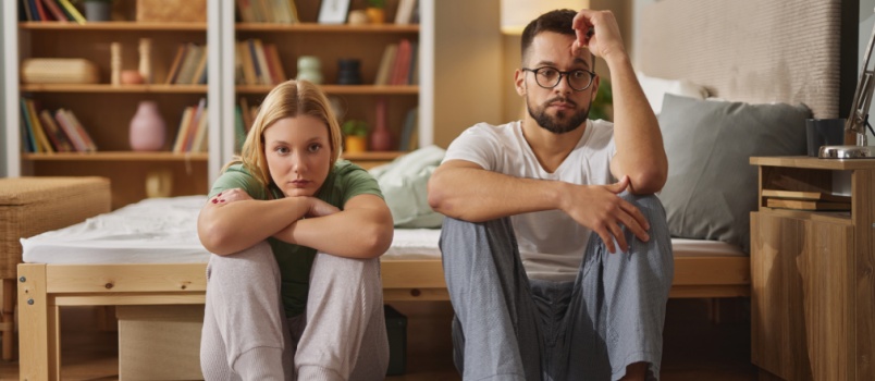 Upset couple ignoring each other