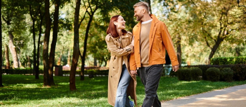 Couple walking in park