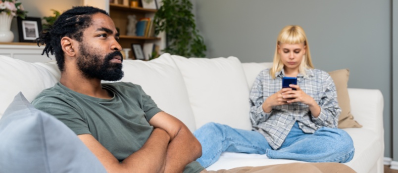 Young couple sitting on couch