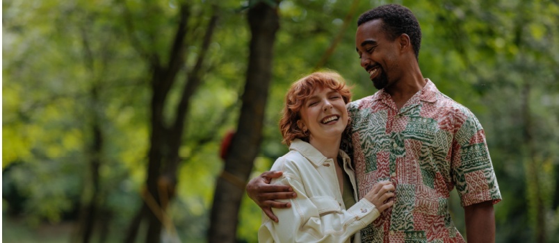 young couple having fun in park 
