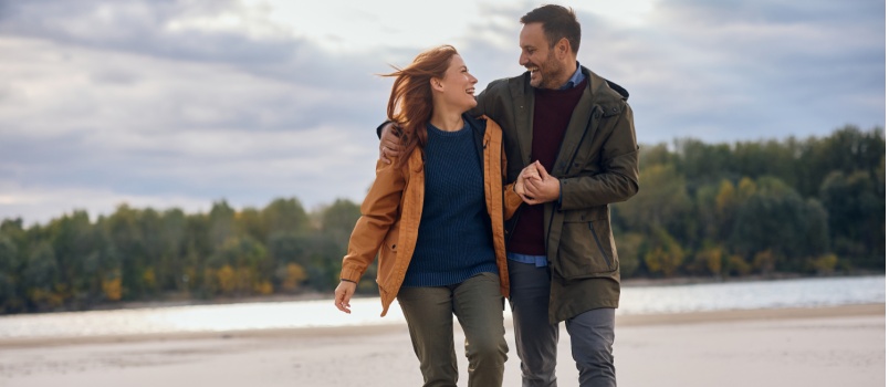Young couple enjoying on beach 