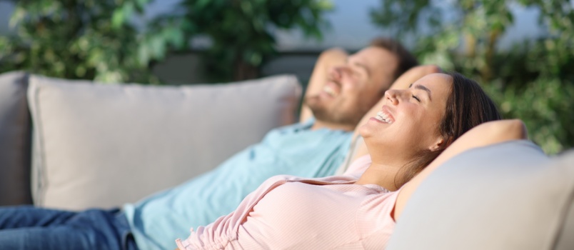 Young couple laying couch
