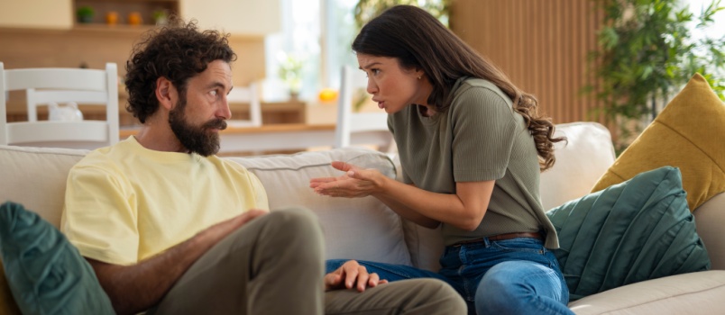 Young couple having serious conversation
