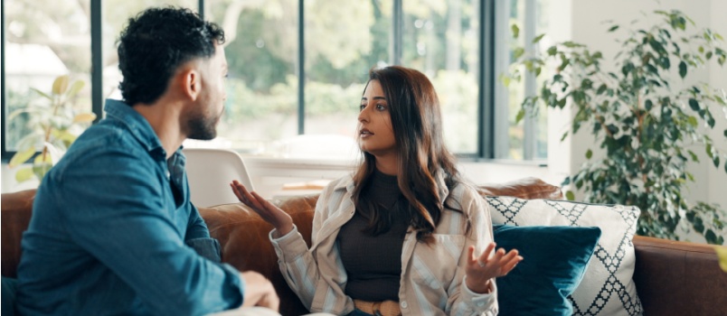 Couple having argument in living room