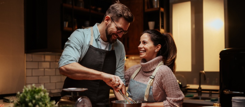 Couple cooking together 