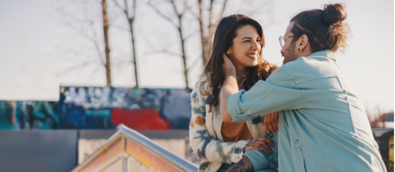 Young loving couple looking at each other