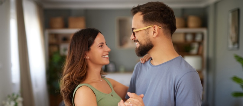 Young loving couple looking at each other 