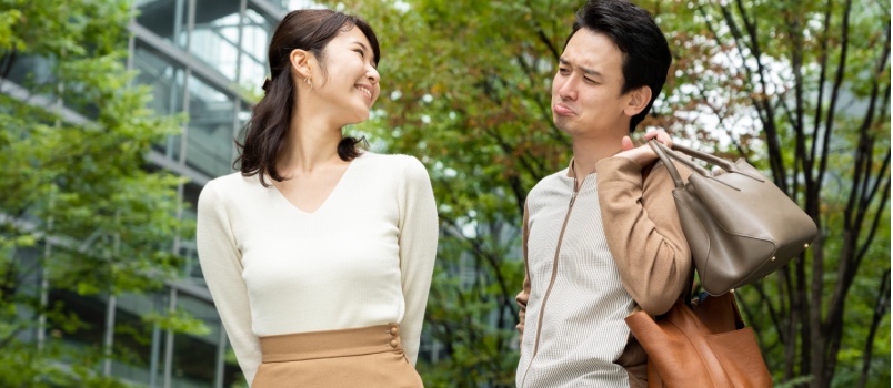 young couple walking outside