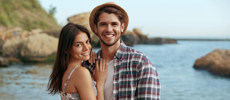 Young couple enjoying on beach 