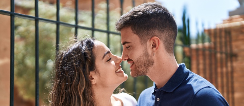 Young loving couple looking at each other