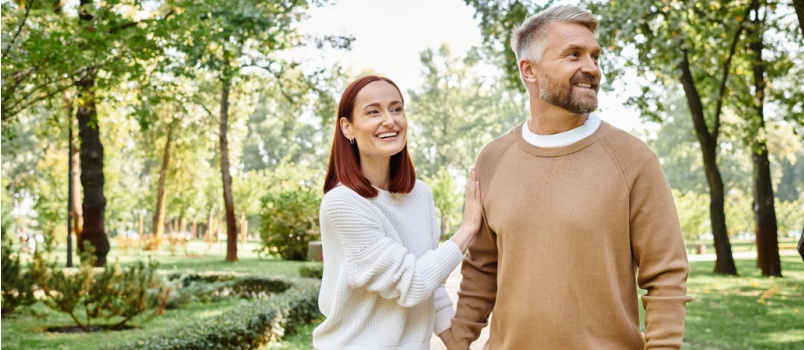 loving couple walking in park