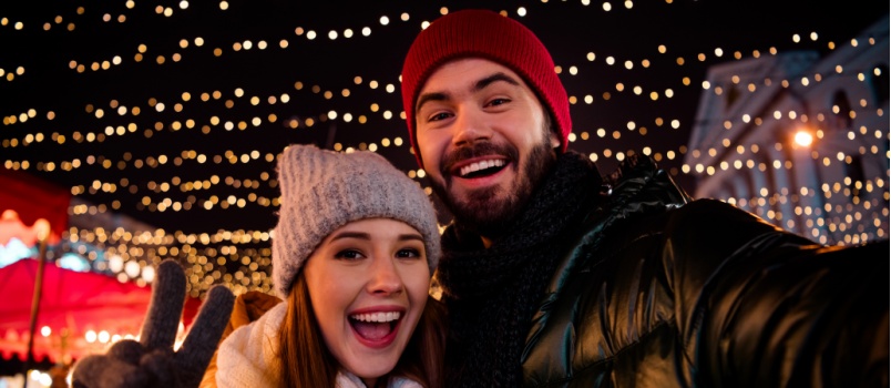 Happy couple taking selfie 