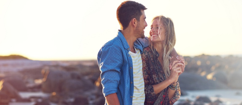 Young loving couple looking at each other