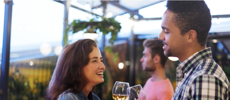 Young couple enjoying drinks