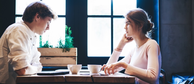 Serious couple discussing relationship problem