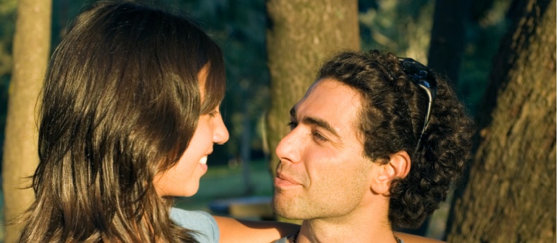 Couple smiling while looking at each other