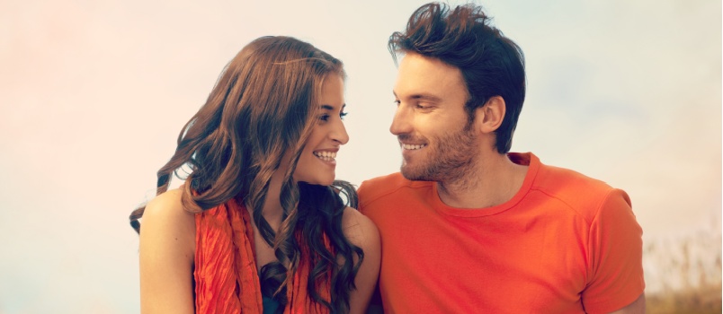 Happy romantic couple looking at each other