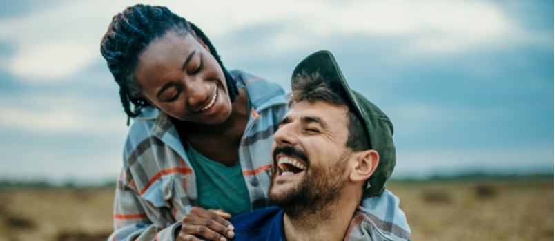 Embracing diverse couple spending day