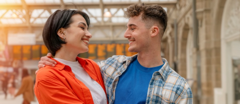 Young loving couple looking at each other