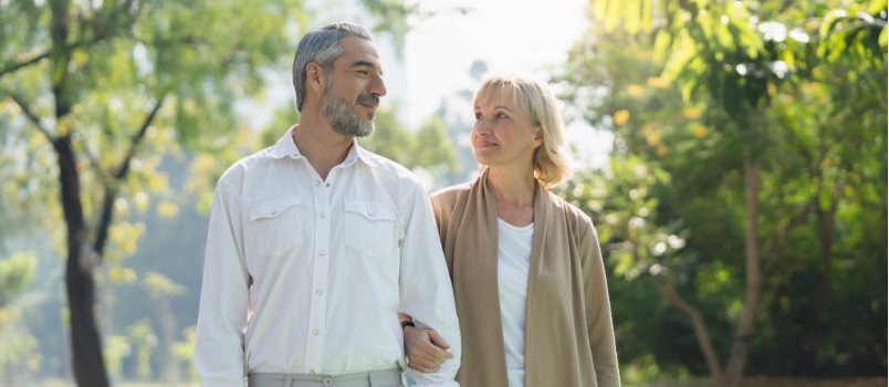 young mature couple walking on street