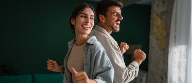 Cheerful couple dancing together
