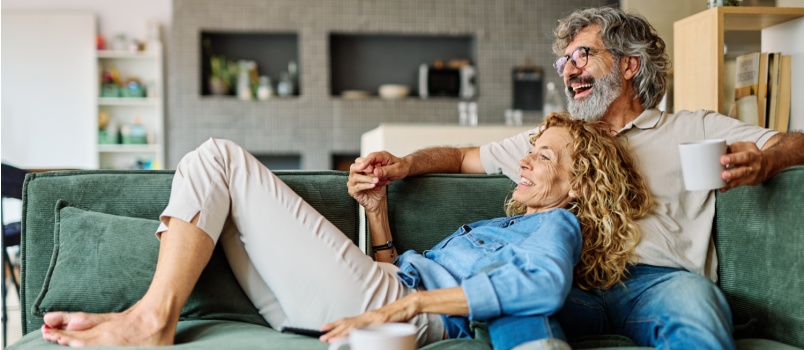 Senior couple embracing talking to each other
