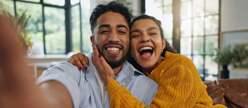 Young couple taking selfie 