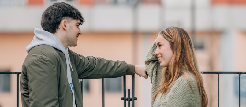 couple on street talking with each other