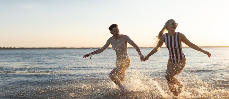 couple enjoying at beach