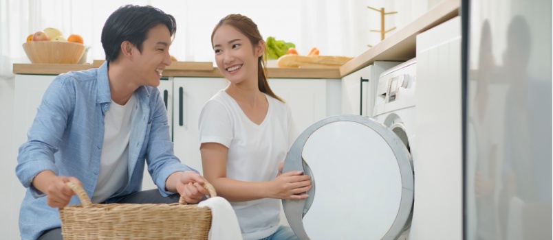 couple doing laundry together