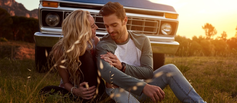 couple travelling by car