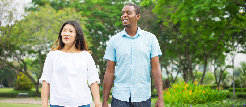 couple walking in park